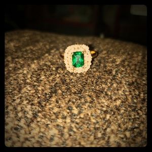 Emerald and diamond gold band ring
